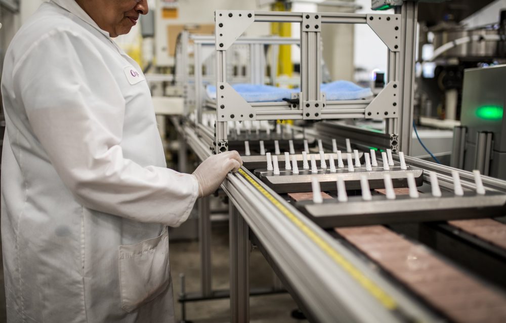 Person overseeing lip balm manufacturing