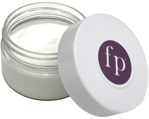 Open jar of lotion with a white lid featuring the ‘fp’ logo, showing the creamy texture of the product inside on a transparent background.