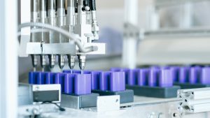 deodorants being filled on a production line