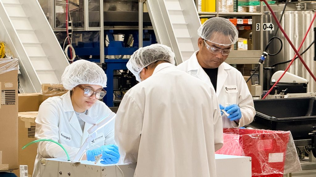 FP employees doing a spot check on products